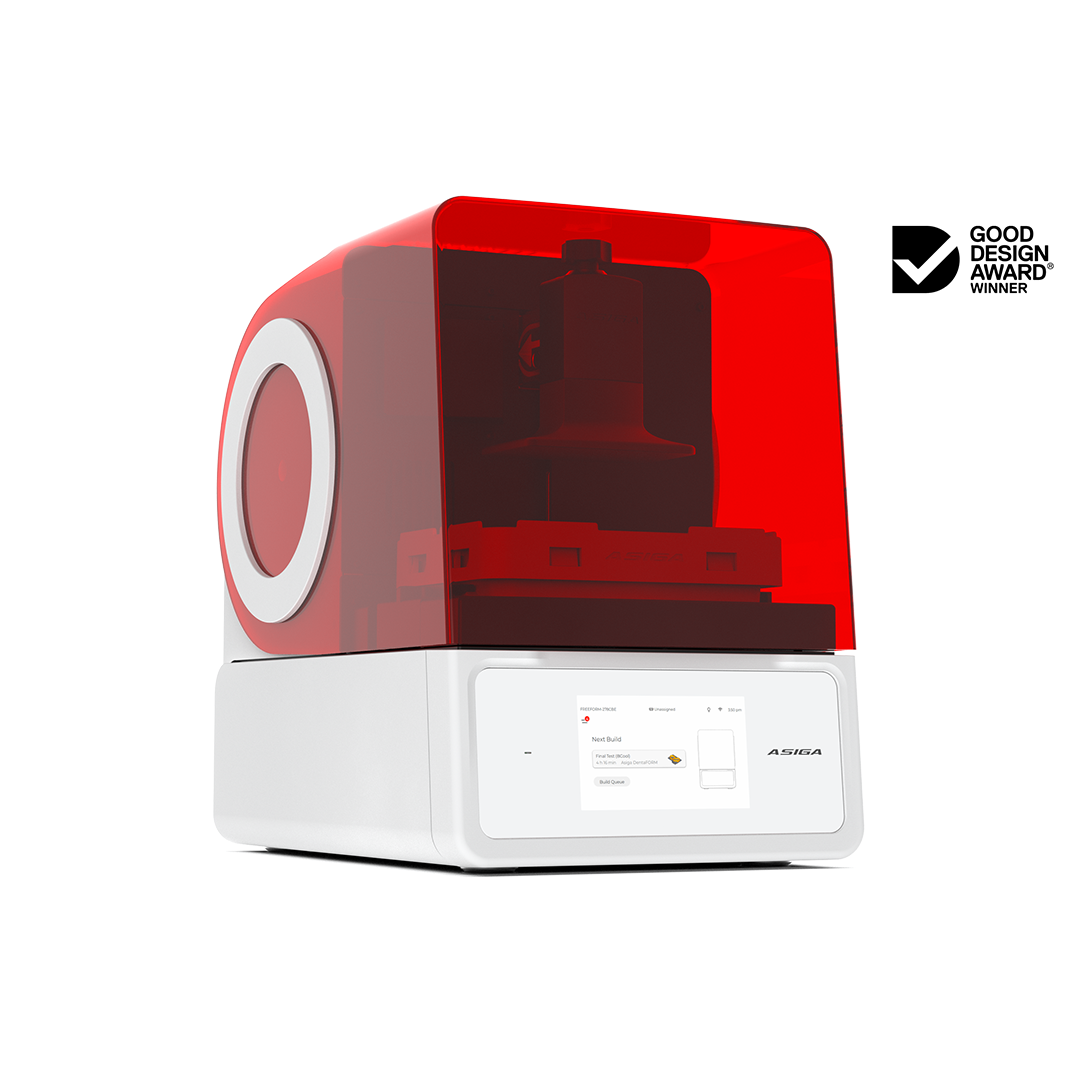 3D printer with red transparent lid on a white background, featuring Good Design Award Winner logo.