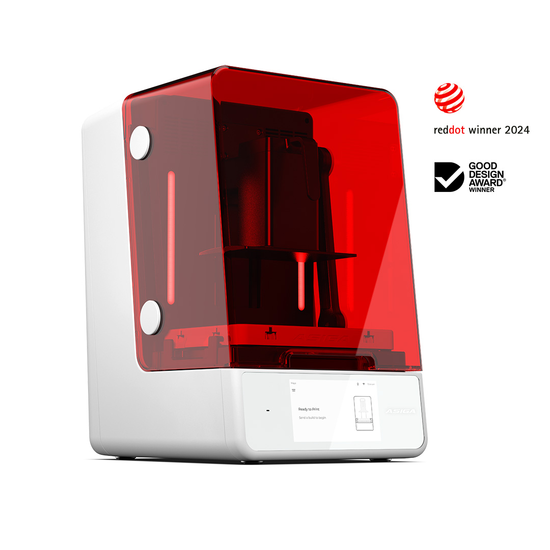 3D printer with red transparent lid on a white background, featuring Good Design Award Winner and Red Dot Award Winner logos.