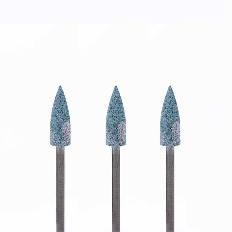 Set of three blue-and-white colored pointed rotary burs on a white background.