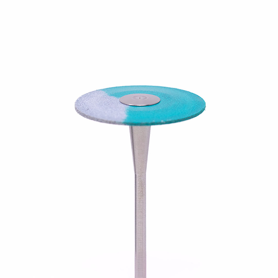 An anax Rotary blue-and-white colored disc-shaped wheel bur on a white background.