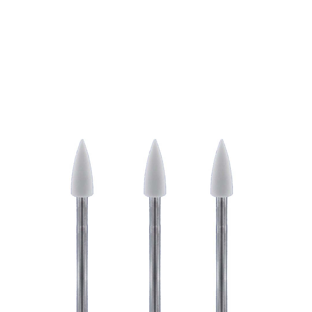 Set of three white, pointed rotary burs on a white background.
