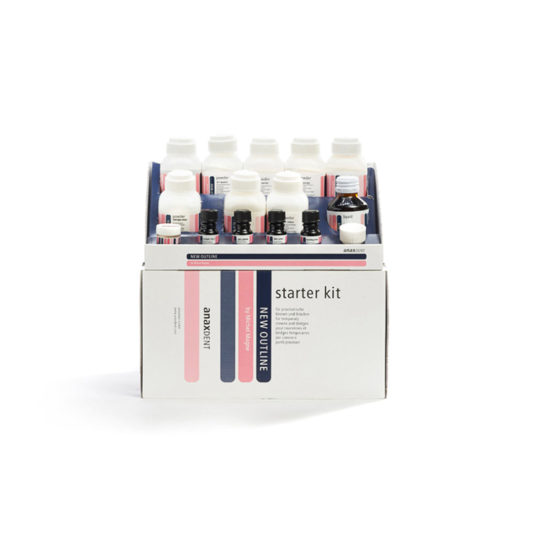 A display of various dental acrylic powder jars and liquids in a cardboard case, labeled with different shades such as White Dentin, A1, A2, A3, B1, Transpa Clear, Medium Value, and High Value, along with Skin Primer and Skin Glaze.