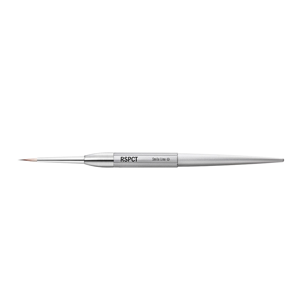 A Smile Line RSPCT Brush for composites. With a soft fine brush tip and metal handle.