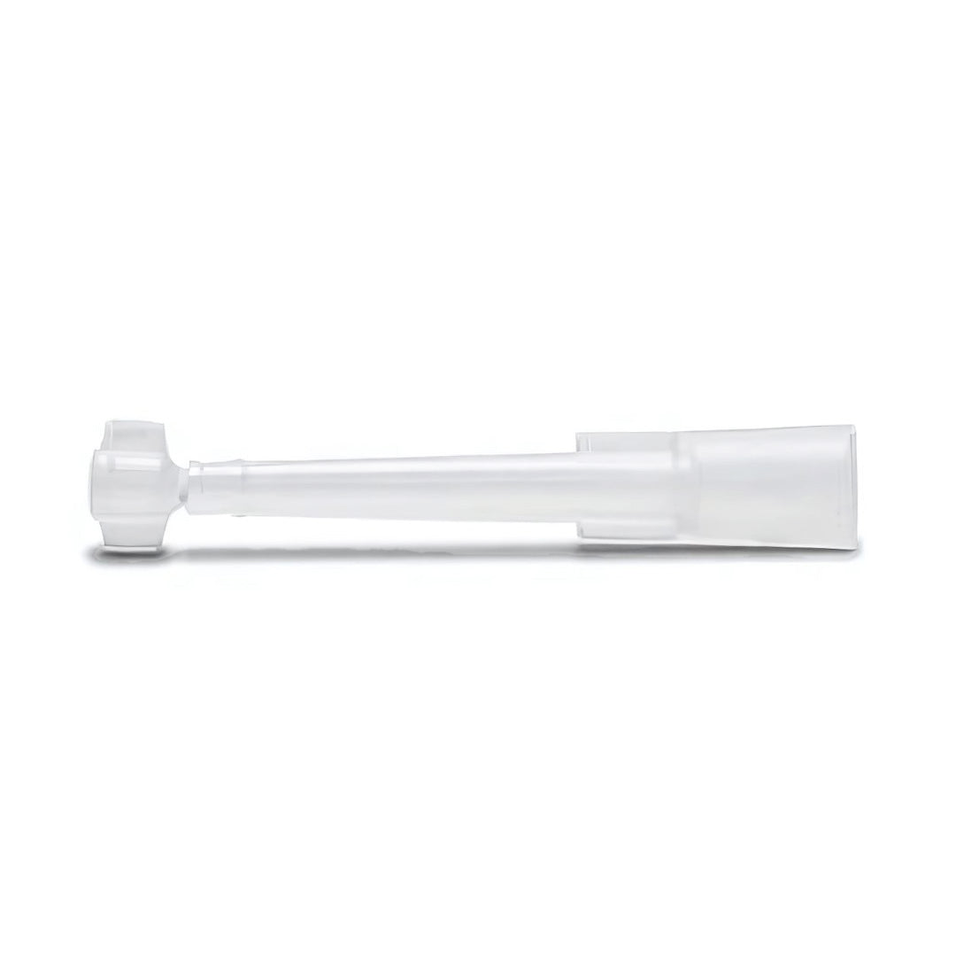 A clear disposable tip attachment for dental material syringes.