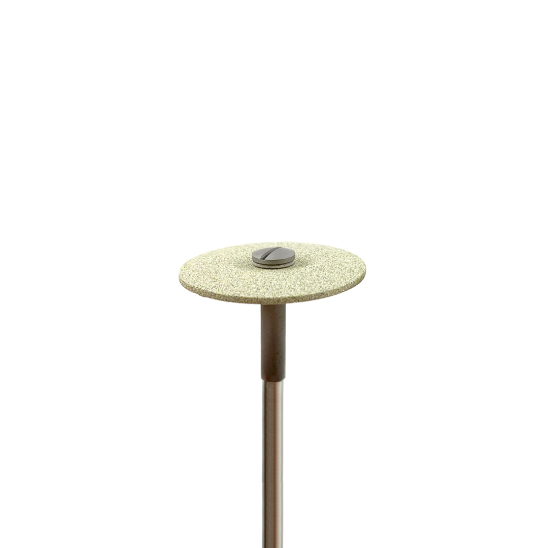 A thin disc-shaped contouring tool on a white background.