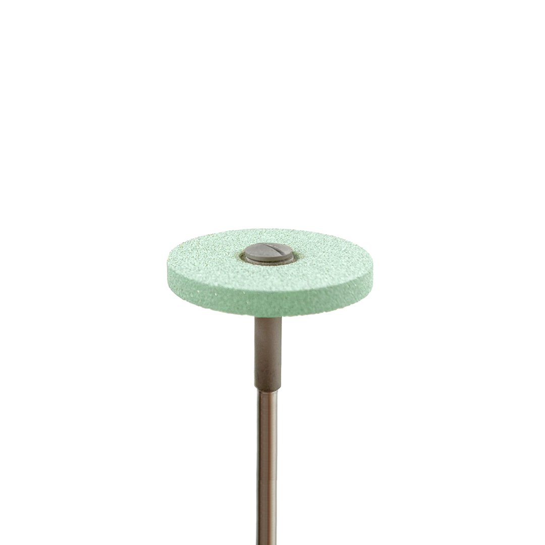 A green contouring wheel on a white background.