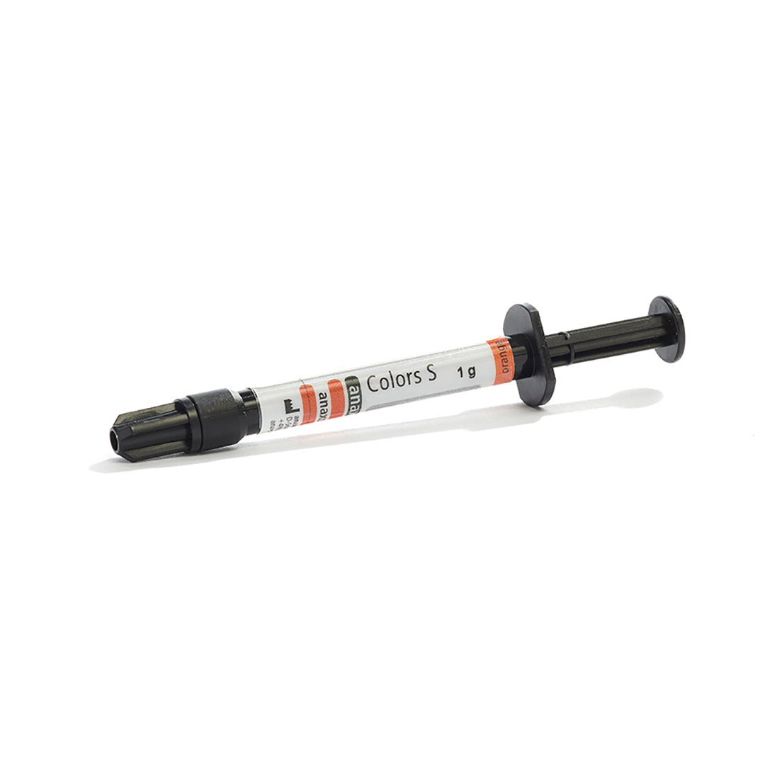 A syringe of dental material on a white background.
