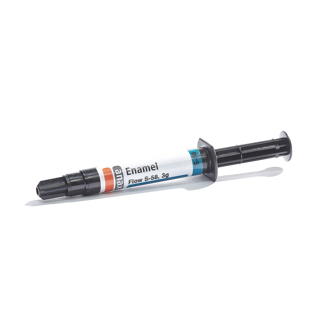 A syringe of dental material on a white background.