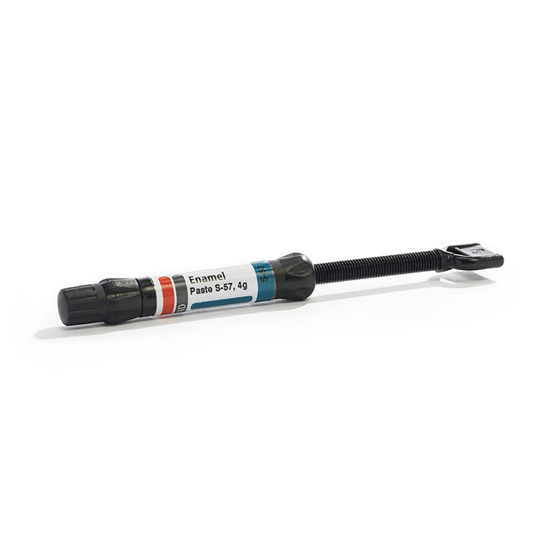 A syringe of dental material on a white background.