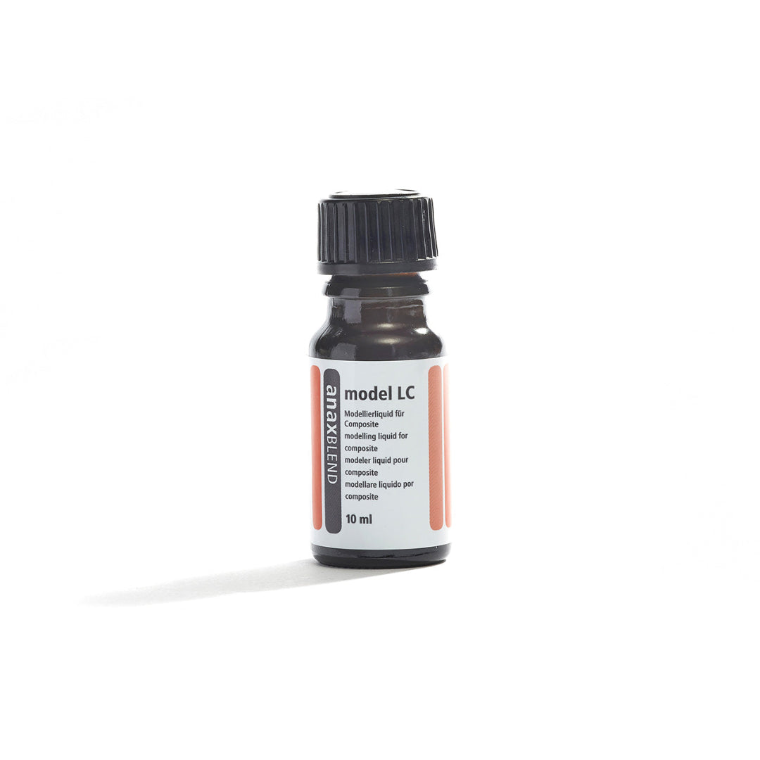 Small black bottle labeled "Model LC" on a white background.