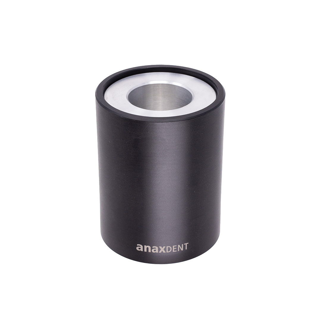 A black composite warmer with the brand name 'anaxdent' printed on it.