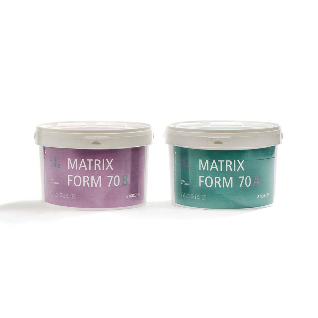 Two putty containers labeled 'MATRIX FORM 70', one purple and labeled "B", and one green and labeled "A", on a white background.