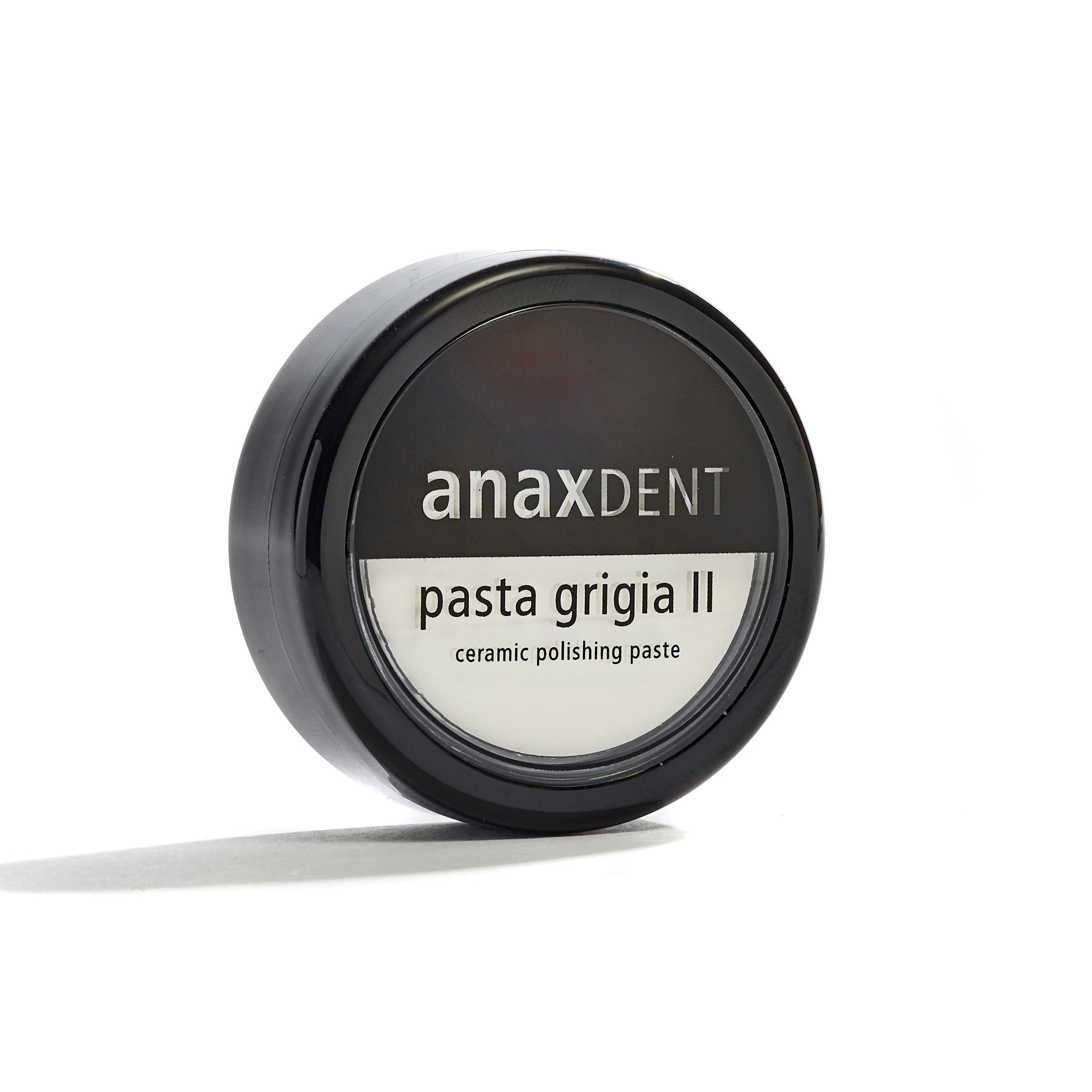 A jar of anaxdent composite polishing paste, labeled as 'pasta grigia II'.