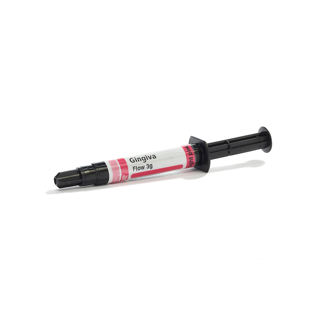 A syringe of anaxgum gingiva flow on a white background.