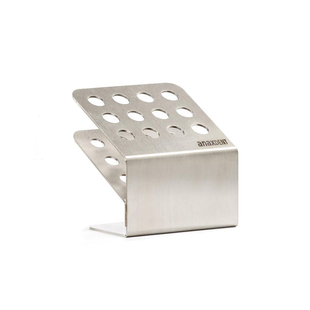 A metal stand with holes in it to hold and organize dental composite syringes.