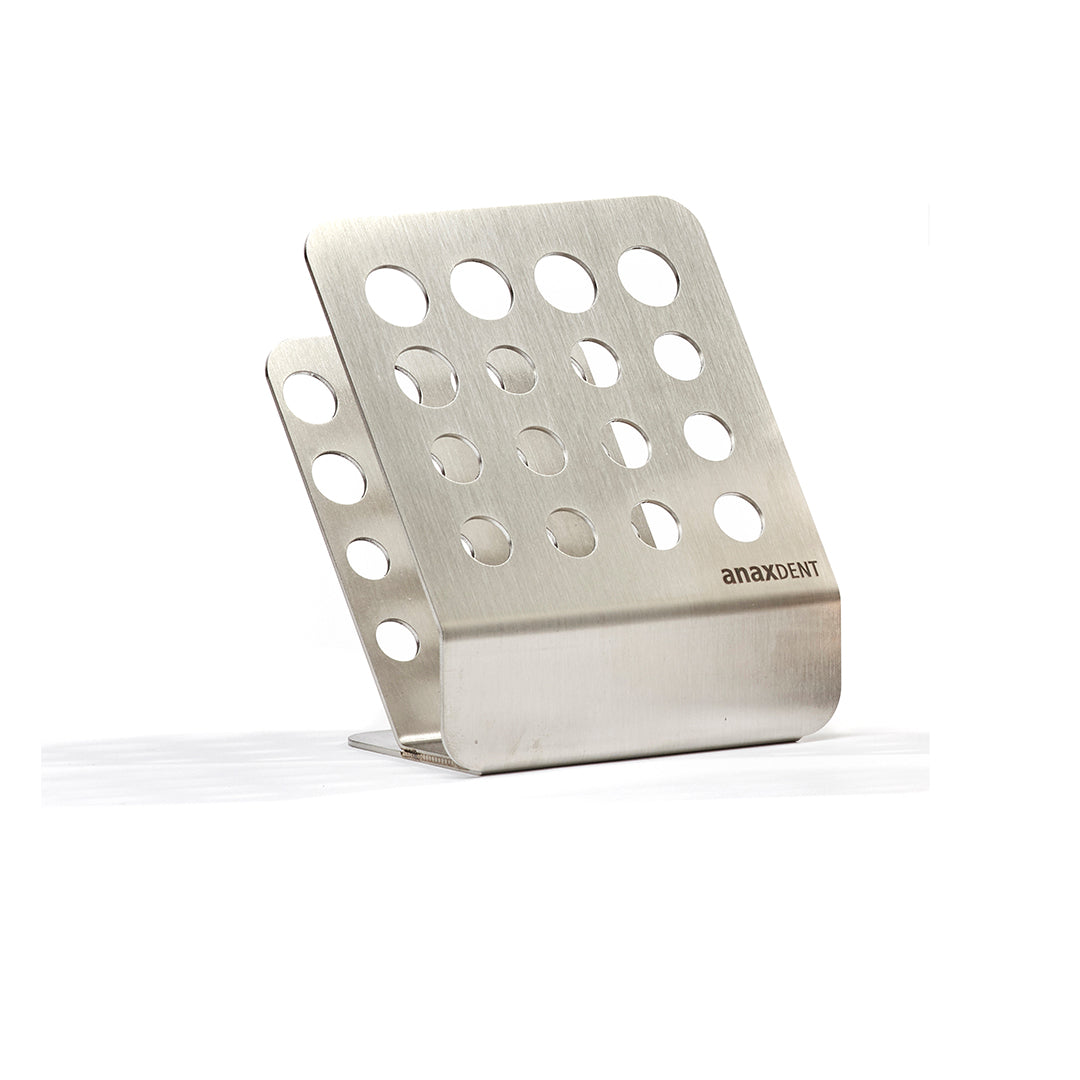 A metal stand with holes in it to hold and organize dental composite syringes.